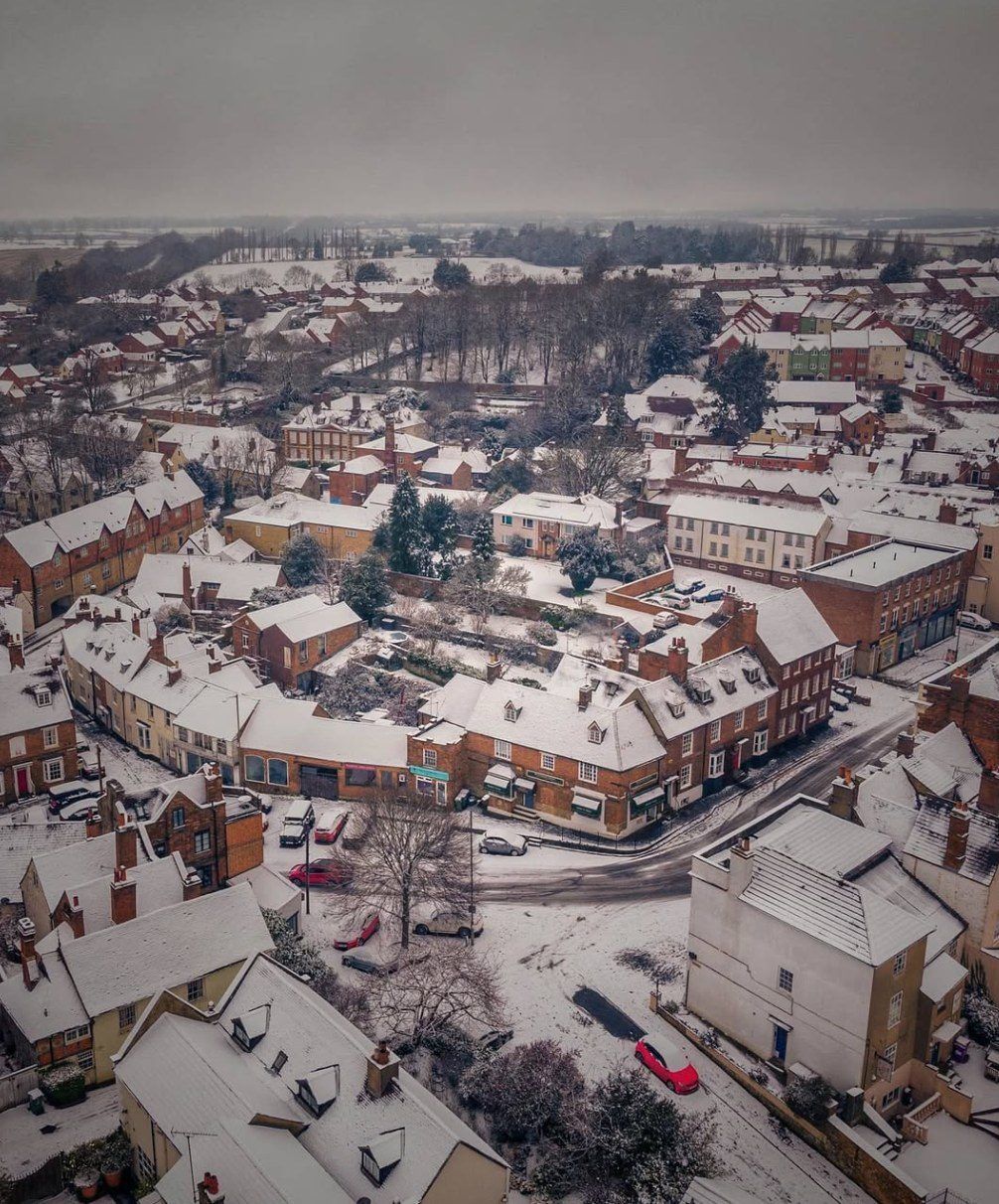 Snow over the rooftops of a market town