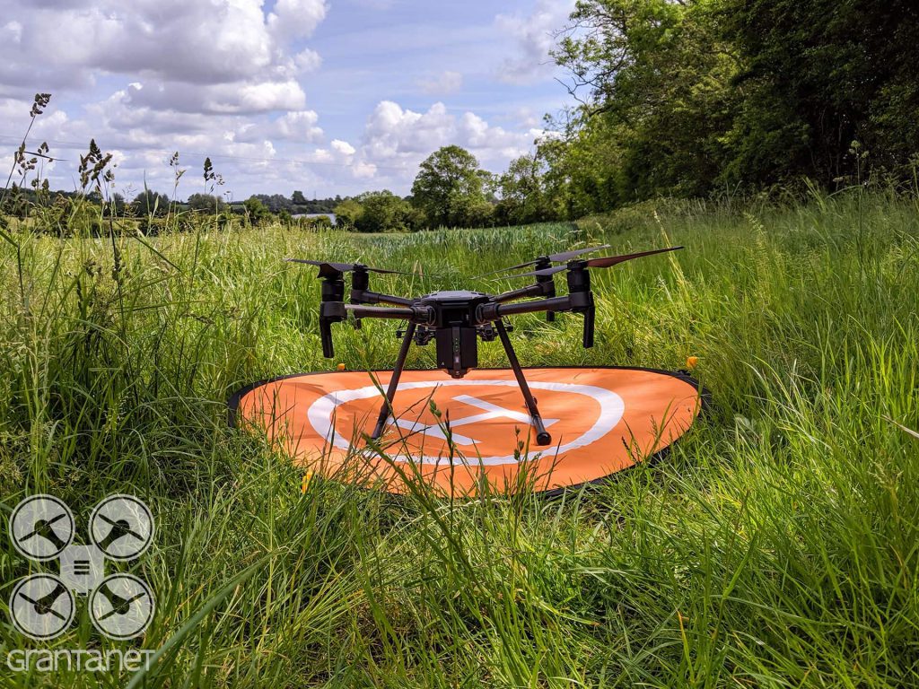 Our DJI Matrice 210 drone on a landing pad
